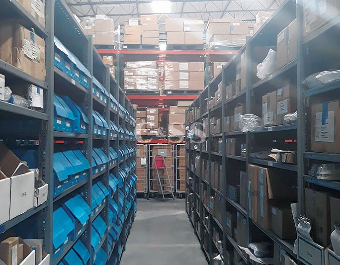 Aisle of Pallet Rack Shelving To Store Car Electronics In Warehouse