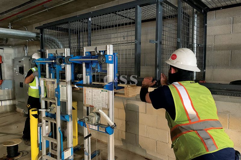 Installers Using Hand Lift for Tenant Storage Lockers