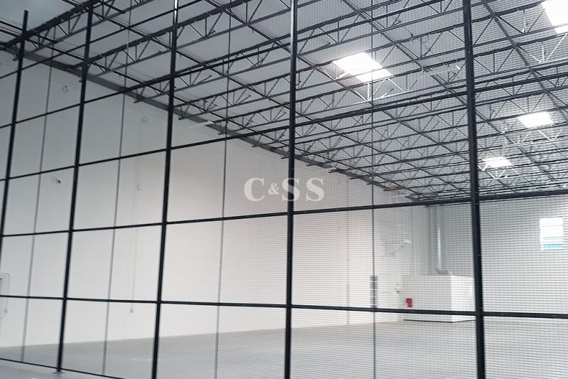 Steel Mesh Storage Cages Installed in Tech Warehouse