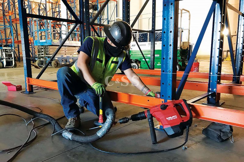 Structural Pallet Rack Beams Being Worked on By CSS Installer